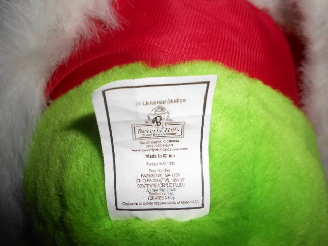 grinch stuffed animal and book